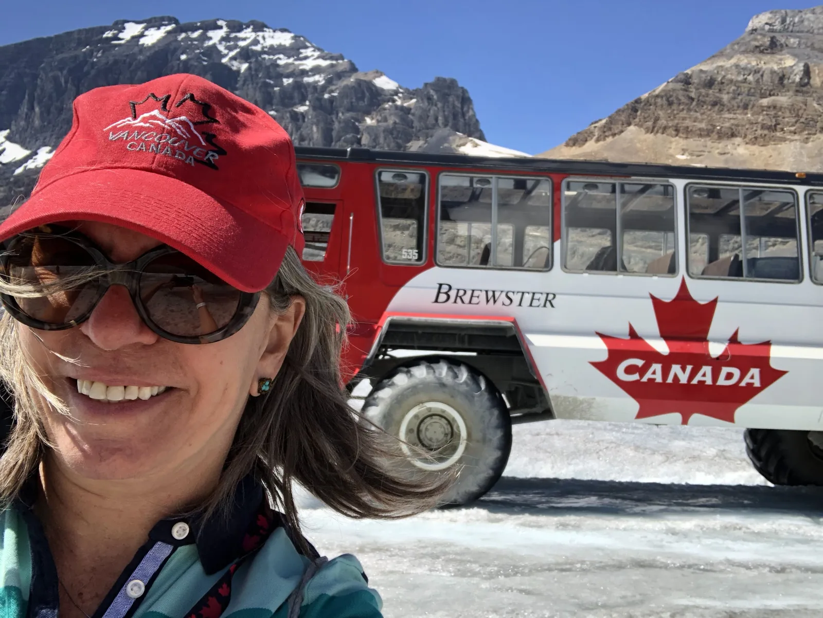 Cecilia with the Ice Explorer at the Columbia Icefields during a private Canadian Rockies tour